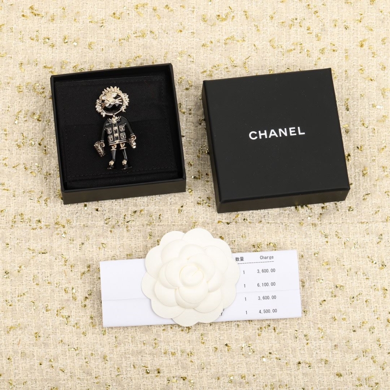 Ch*el brooches